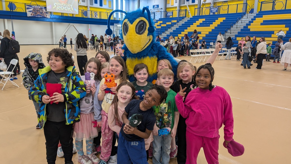 Mosterpalooza first graders with mascot