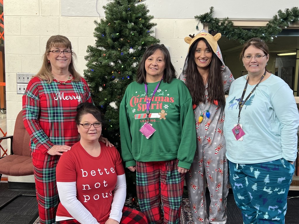 School staff in pajamas