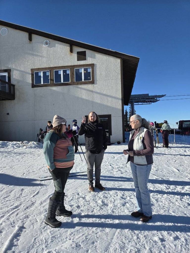 teachers standing on snow
