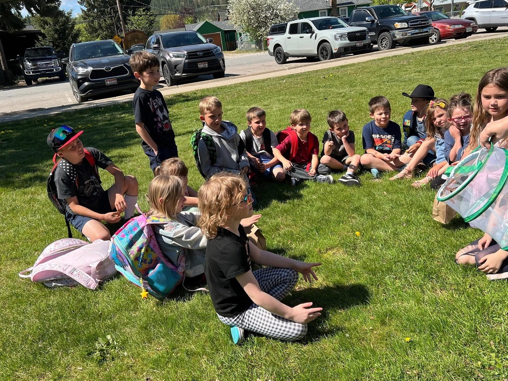 Mrs. Miller's 1st grade class releasing their butterflies. 