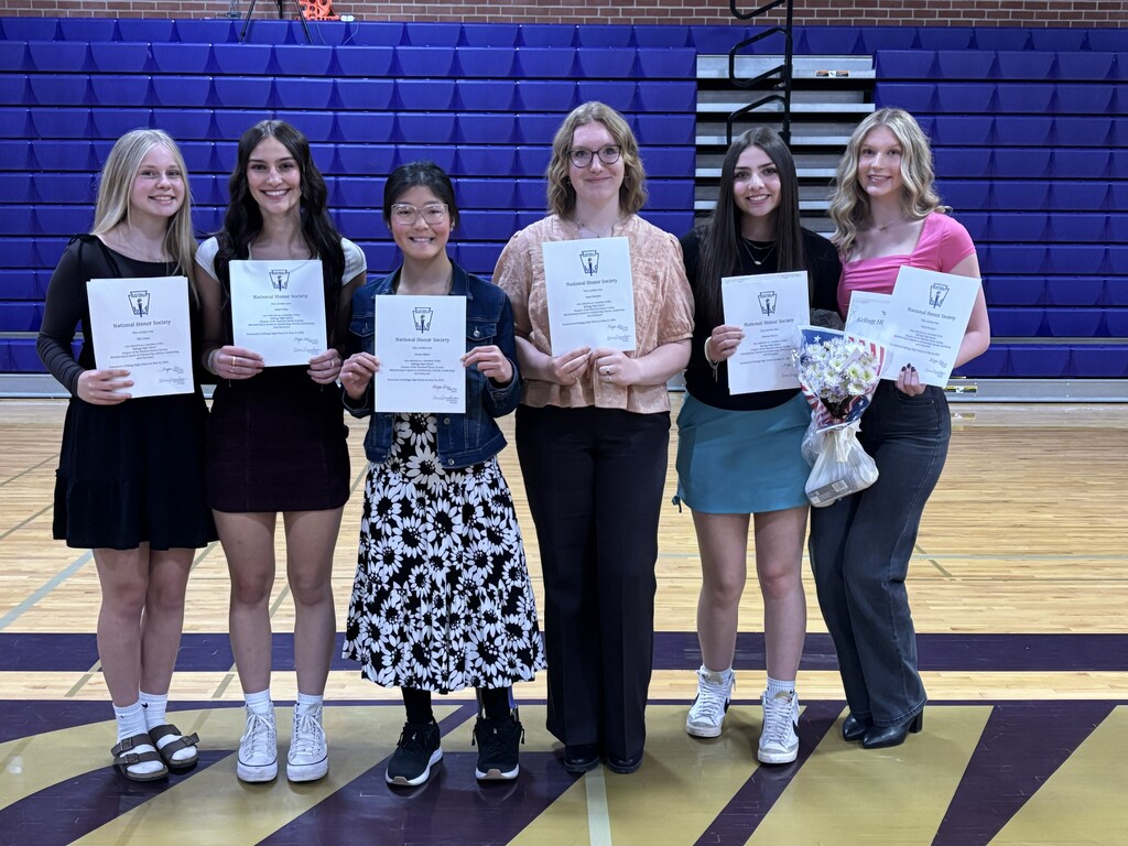 Students posing with awards