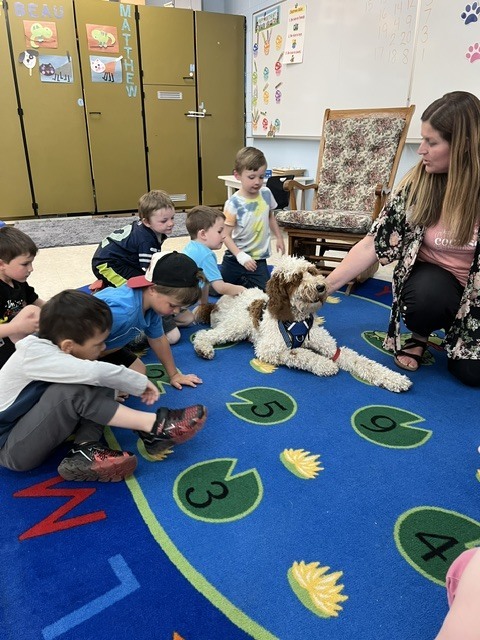 students with a dog