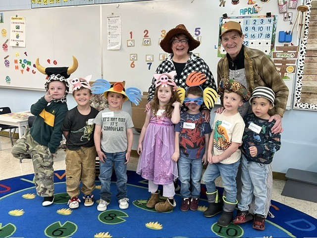 students with funny farmer characters