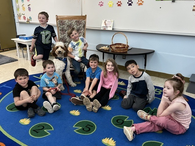 students with a dog