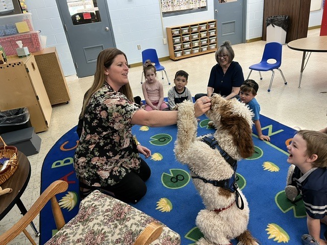 students with a dog