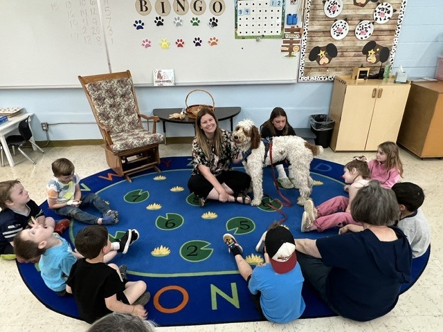 students with a dog