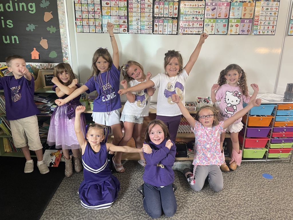 2nd grade students getting ready for assembly