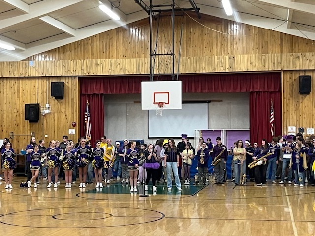 High school students talking at assembly