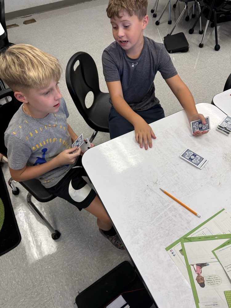 4th Graders playing "Flip It" to practice their multiplication facts✖️🃏