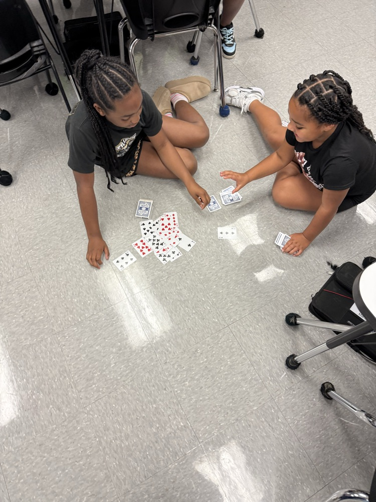 4th Graders playing "Flip It" to practice their multiplication facts✖️🃏