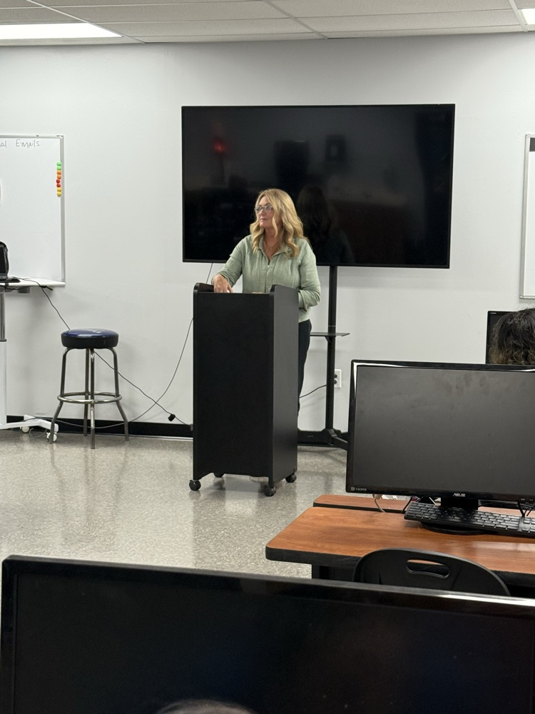 Ms. Lisa Johnson speaking to Business Communications class.