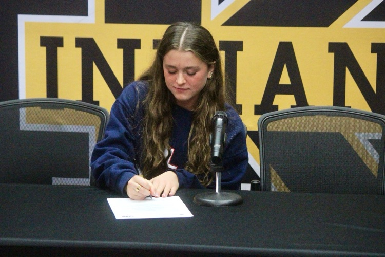 Ella Gardner signing to play volleyball at Lyon College. We are so proud of you!