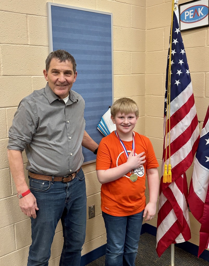 Board Member Jim Henry and TES Student Ben Taras leading the pledge