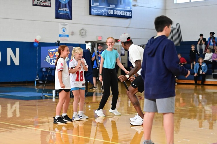 Students and Ted Ginn Jr.