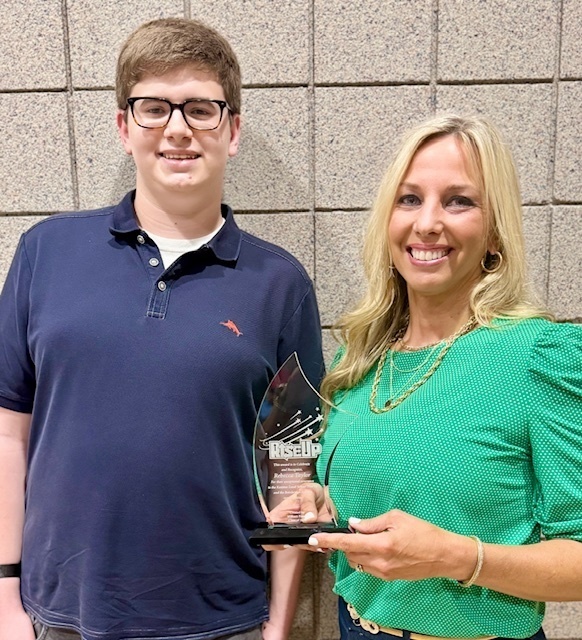 Rebecca Taylor and Student William Eisner with the Rise Up Trophy
