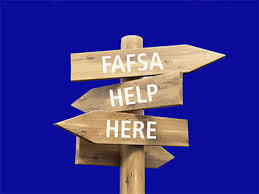 arrowed wooden sign saying fafsa help here