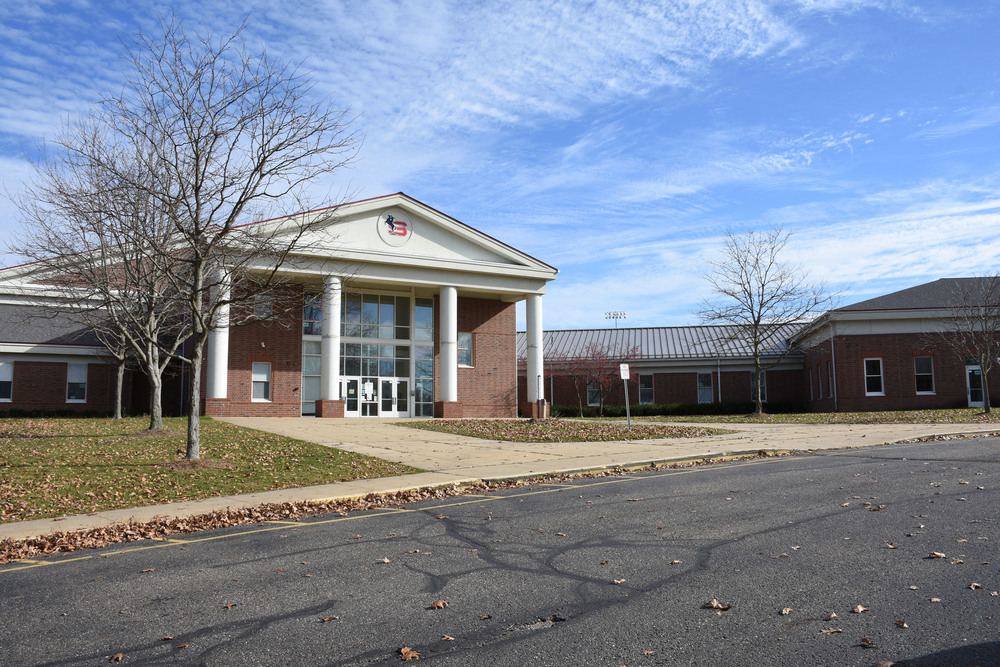 Outside of Stanton Middle School, brick building with white trim.