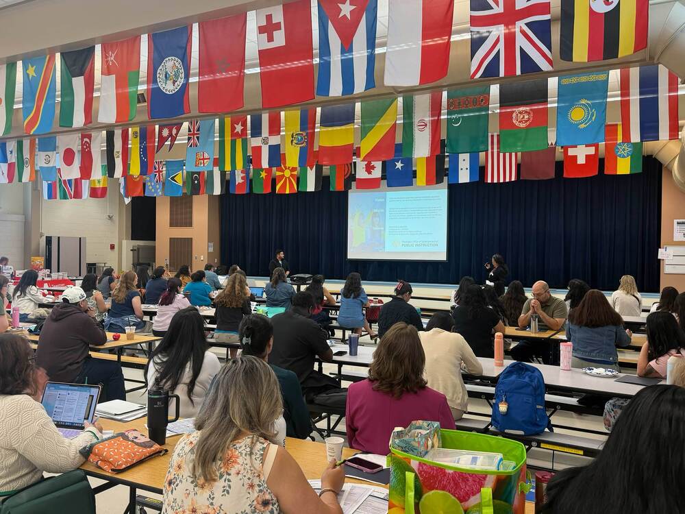 Dual language educators gather for the first Spanish Academy held at Mill Creek Middle School.
