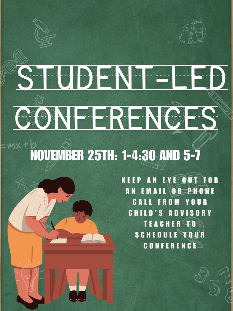 A teacher talks to a student at a desk.