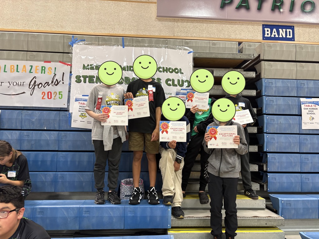 Meekers Robotics club poses for a picture together with the certificates that they were awarded. Faces have been covered with a smiling emoji per KSD safety protocol. 