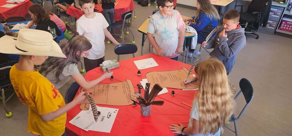Students writing classroom constitutions