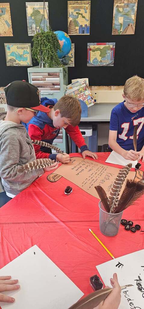 Students writing classroom constitutions