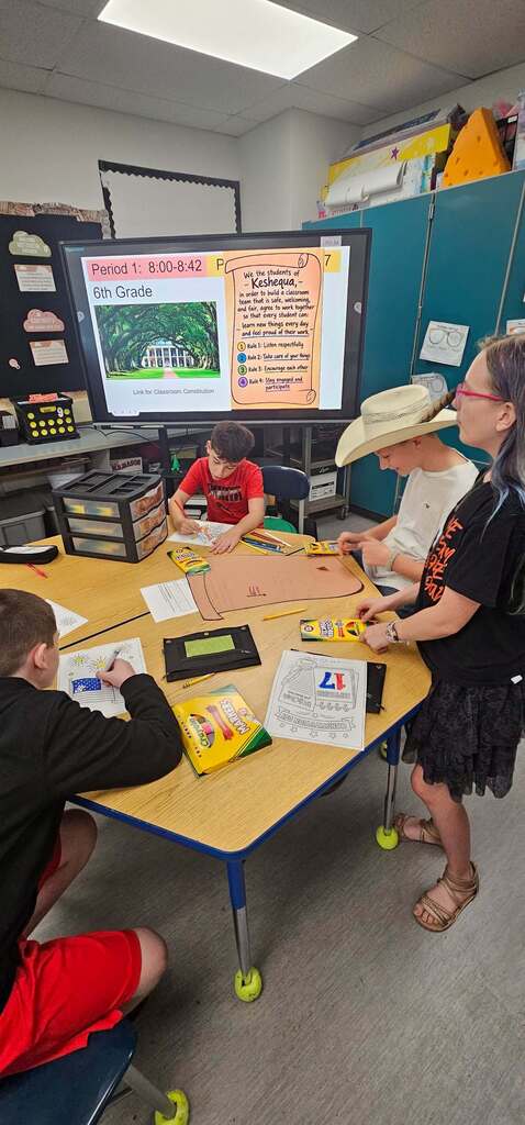 Students writing classroom constitutions