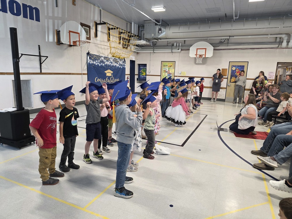 Student dancing at kindergarten graduation
