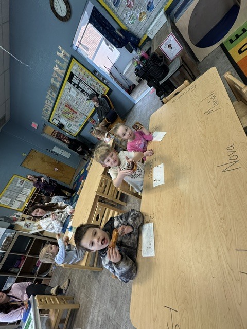 students at ELC eating at treat