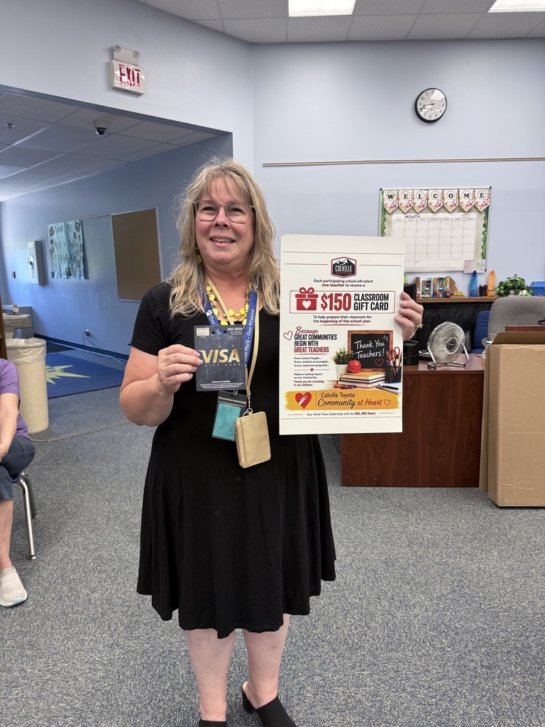 Trini with her gift card from Colville Toyota