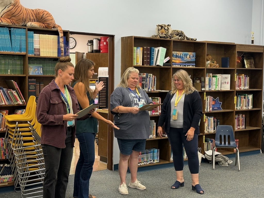 Teachers at the Elementary doing a team building activity.
