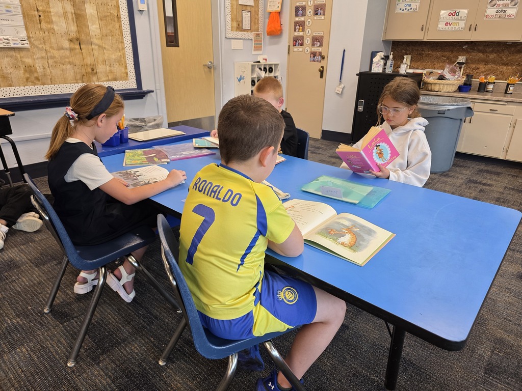 Students reading books in class.
