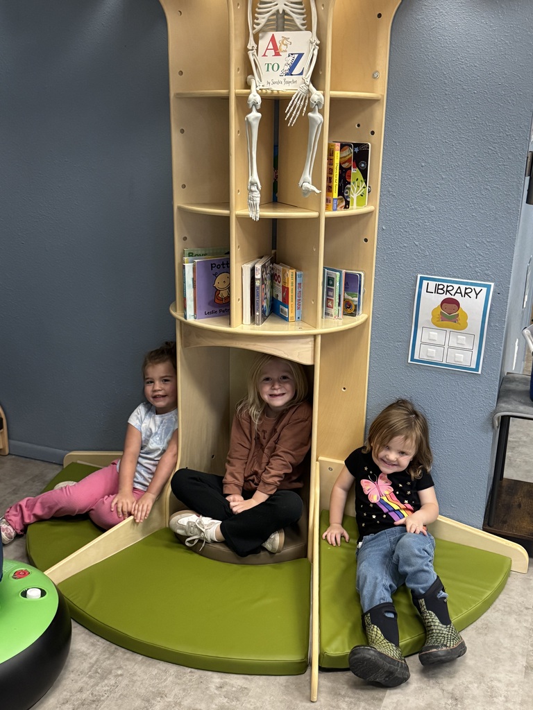 students sitting in the book nook