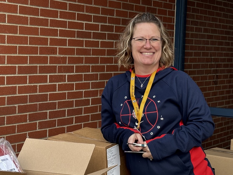 Mrs. Hooper passing out cookie dough