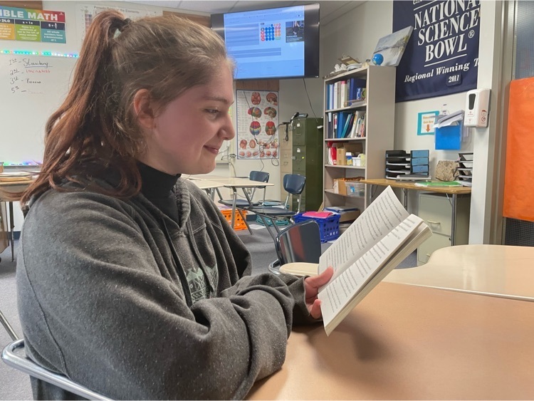 Jasmine reading a book