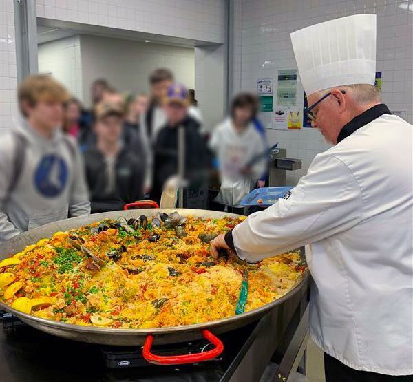 Chef Bruce serving paella