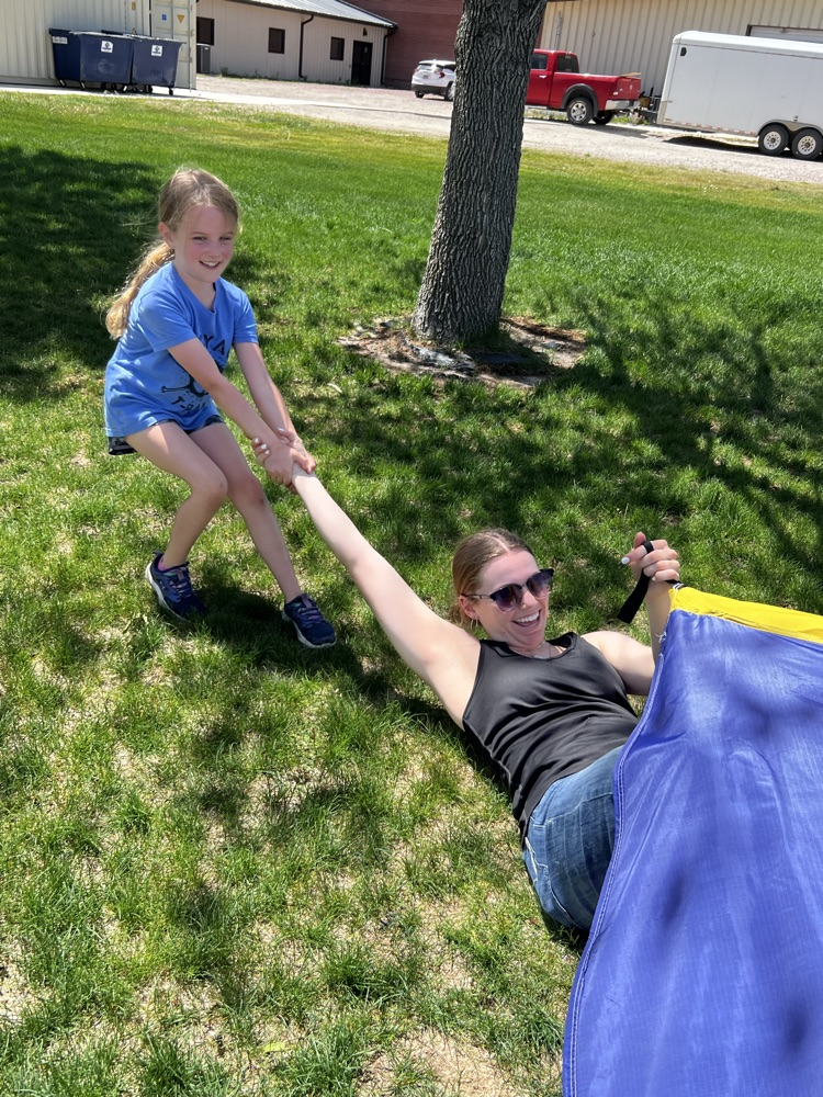 little girl pulling big girl