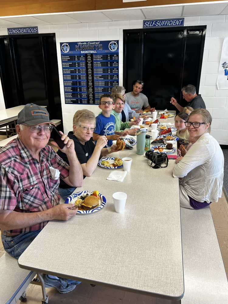 people at table eating