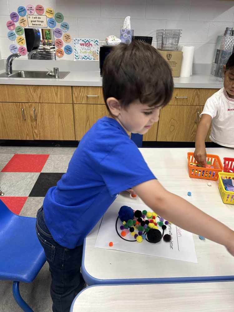 Using fine motor and to learn the first letter in our name!