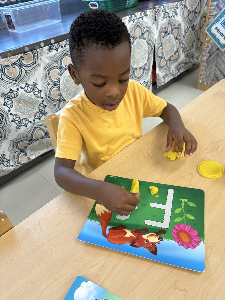 making letters with play-doh