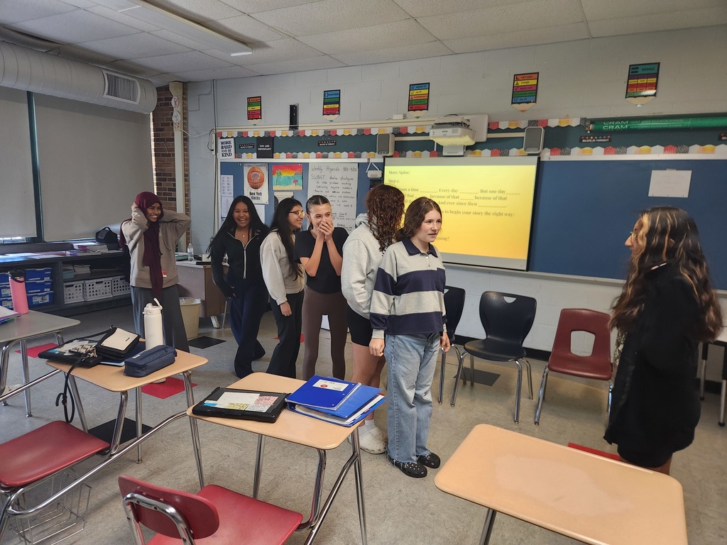 8th graders working on some improv in drama class.