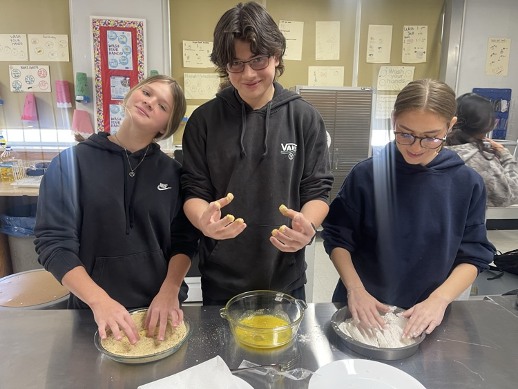 Breading the mozzarella sticks!!
