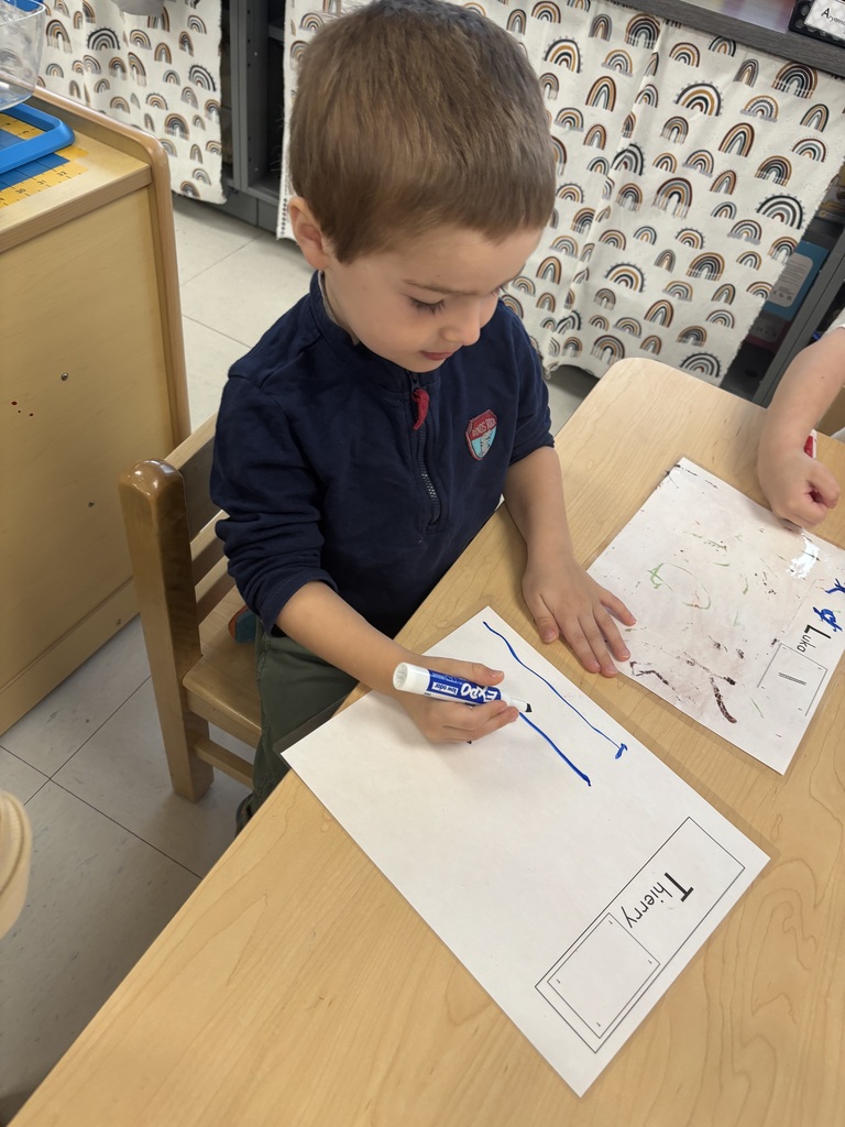 Learning to write our name is Pre-K!