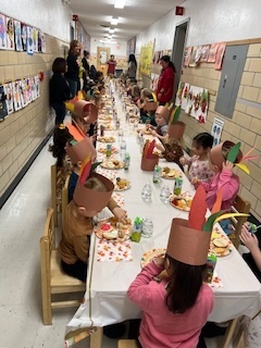 Pre K Students enjoying their Thanksgiving Feast!