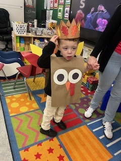 Pre K student dressed as a turkey