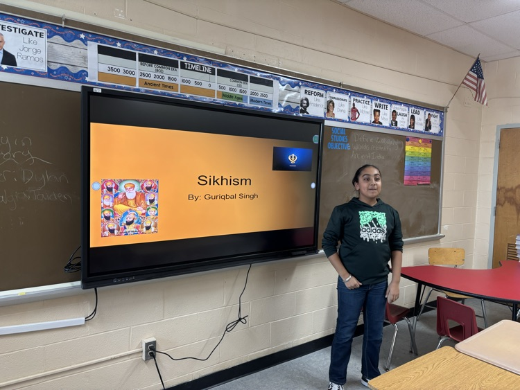 So proud of my student for making a presentation to teach his Social Studies class about his culture!