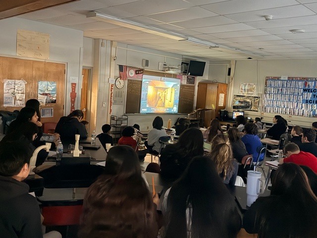 kids watching a screen