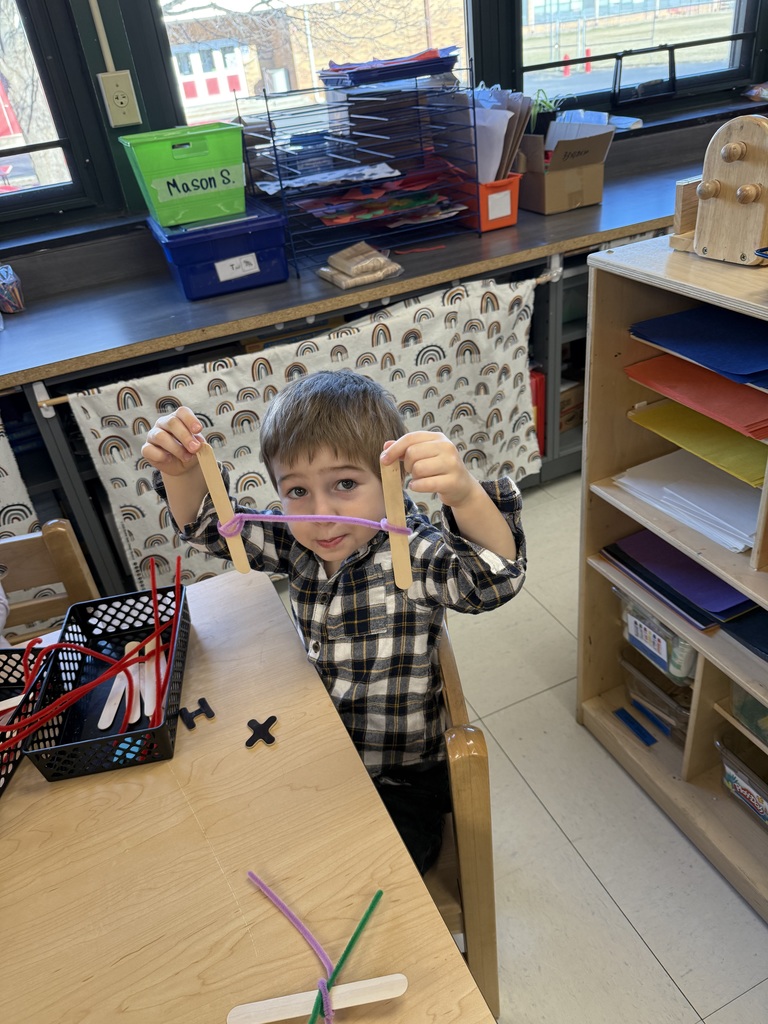 Learning about straight lines and curved lines in letters.