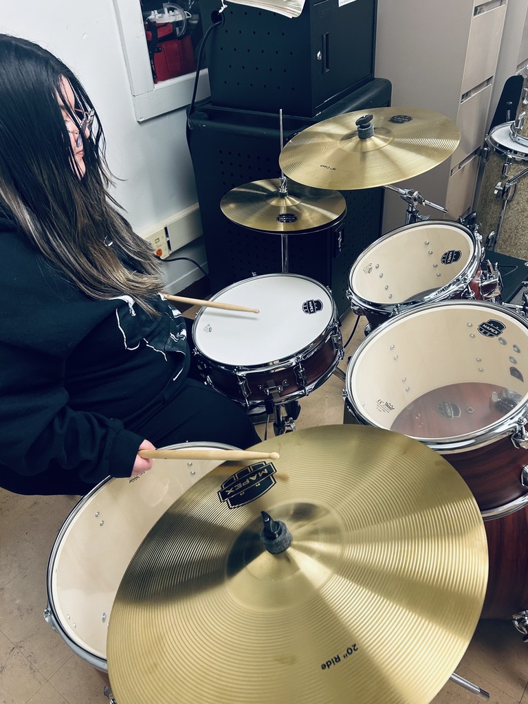 Gabby in action on the drums