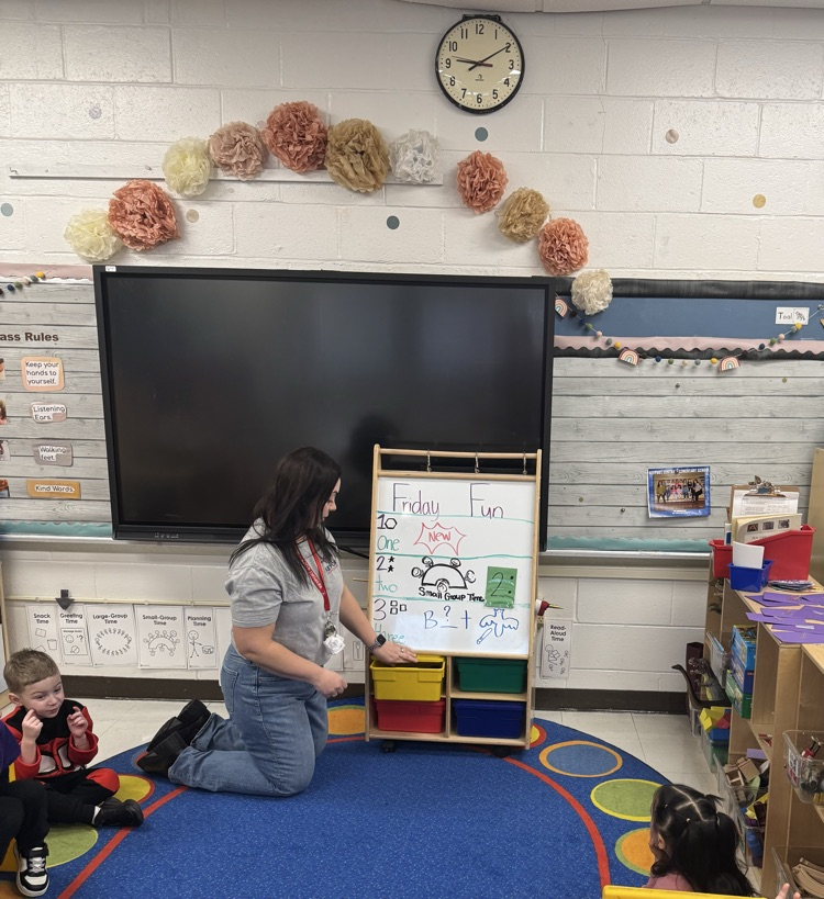 teacher in morning meeting 